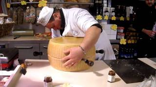 How to crack a Parmigiano Reggiano Wheel [upl. by Volney360]