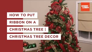 How to Put Ribbon on a Christmas Tree  Christmas Tree Decor  Hobby Lobby® [upl. by Aihsemaj]