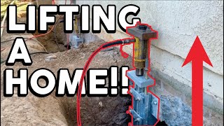 Lifting a homes foundation with Push Piers [upl. by Oringas]