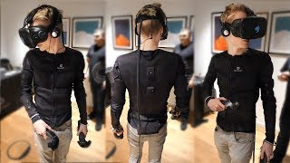 This Haptic Suit Lets You Touch and Feel Virtual Reality  Teslasuit [upl. by Ashly]