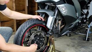 Front Wheel Removal and Installation Ninja 1000  Z1000SX  Z1000 [upl. by Aneehsirk]