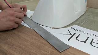 How to easily install vinyl flooring around a toilet [upl. by Cosenza485]