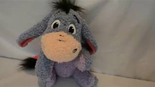 Mattel Disney Eeyore Singing Giggle Stuffed Animal [upl. by Naneik436]