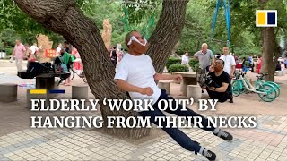 Elderly Chinese do ‘neck workouts’ by hanging from trees [upl. by Aitekram]